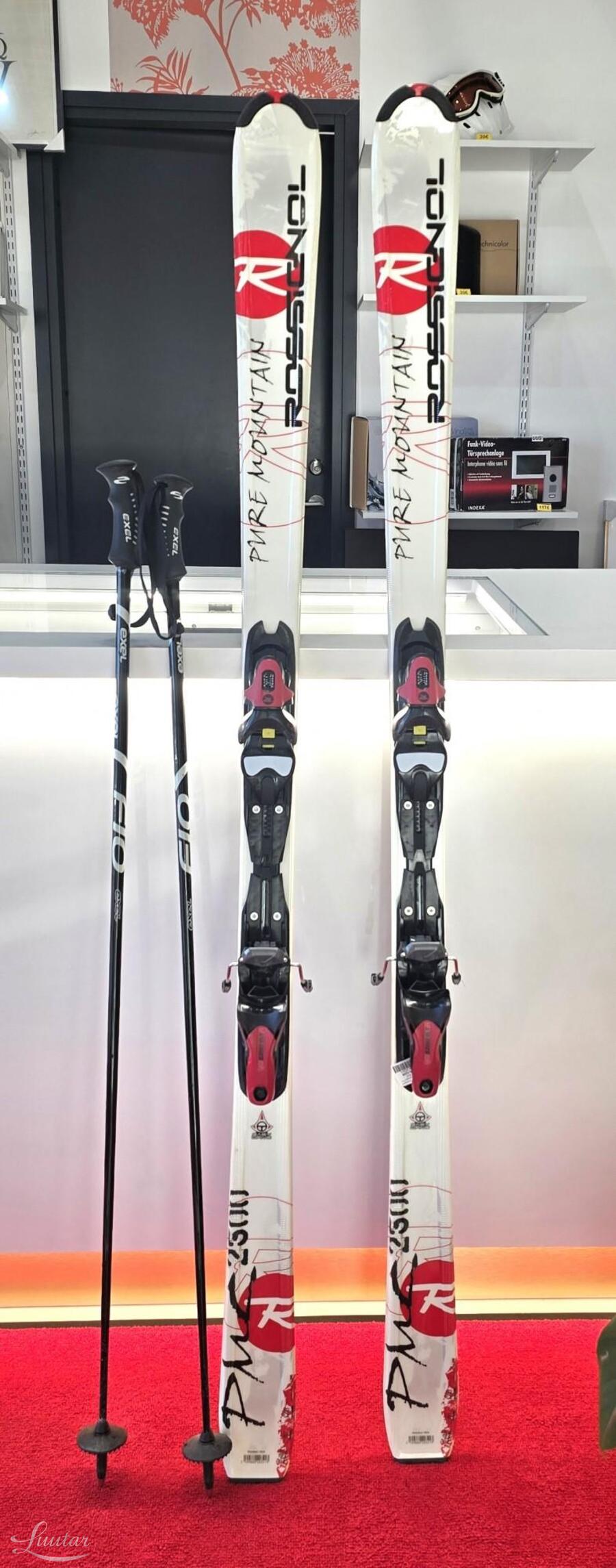 Suusad Rossignol PMC 2500 ja suusakepid Fio Exel 