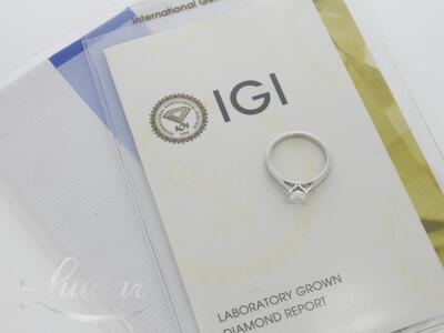 Kuldsõrmus 750* Briljandid 0.71ct + 0.11ct