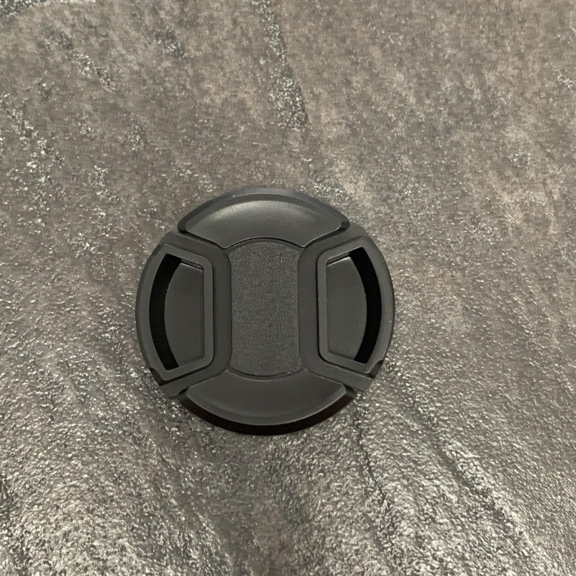 Tootefoto - Kaamera objektiivikork 49mm